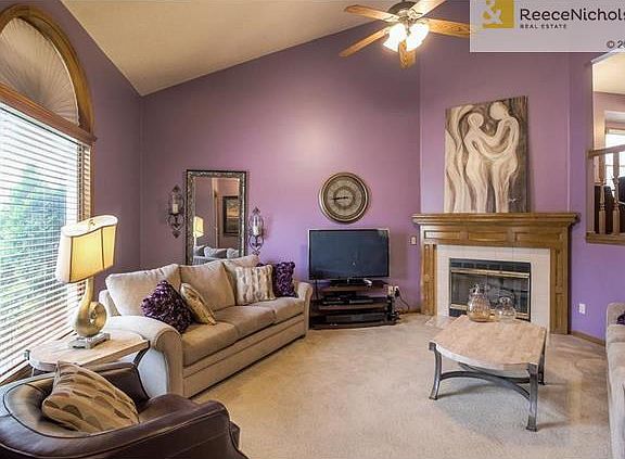 Vaulted ceiling & fireplace in living room