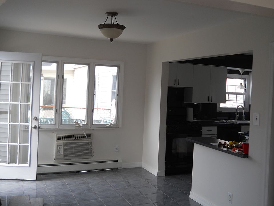 DINING ROOM/VIEW OF KITCHEN