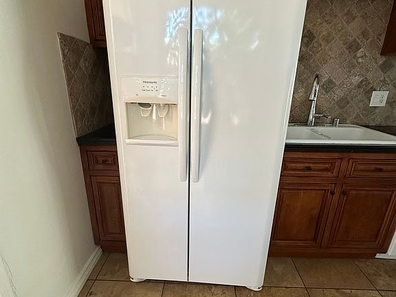 double door fridge with filtered water dispenser and ice maker