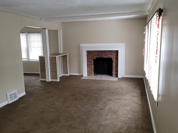 Family room with adjacent dinning room