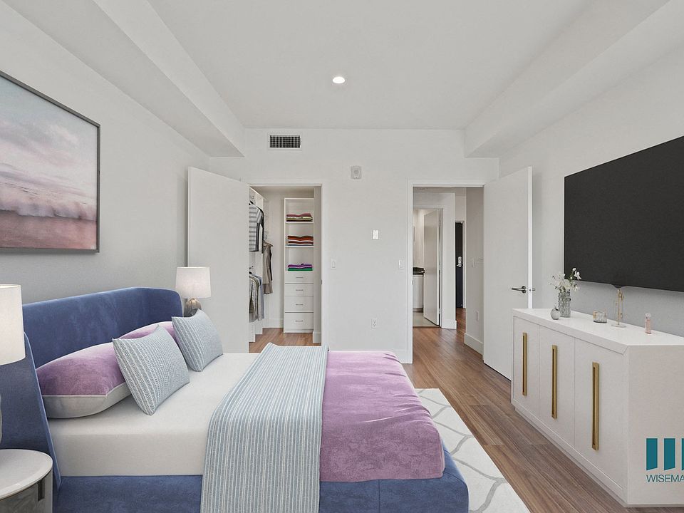 Spacious Bedroom with Walk-In Closet with Built-In Organizers