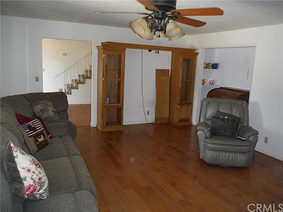 Additional view of living room showing pop in closet