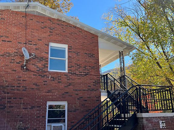 Only four units per building - Only one shared wall (kitchen/living room)