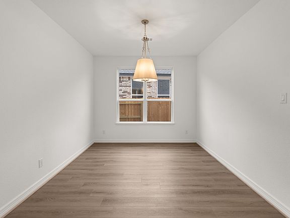 The dining area is a perfect blend of style and functionality, providing an inviting space for memor