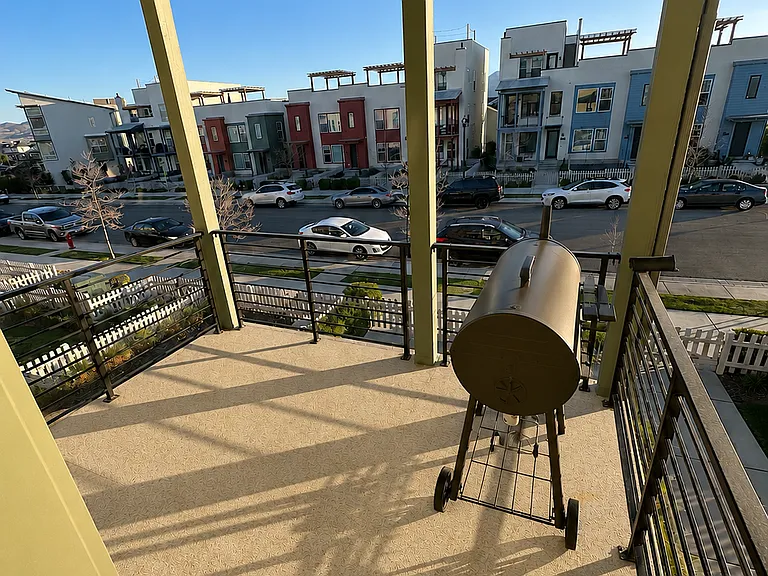 Deck off of kitchen is great for grilling and dining.