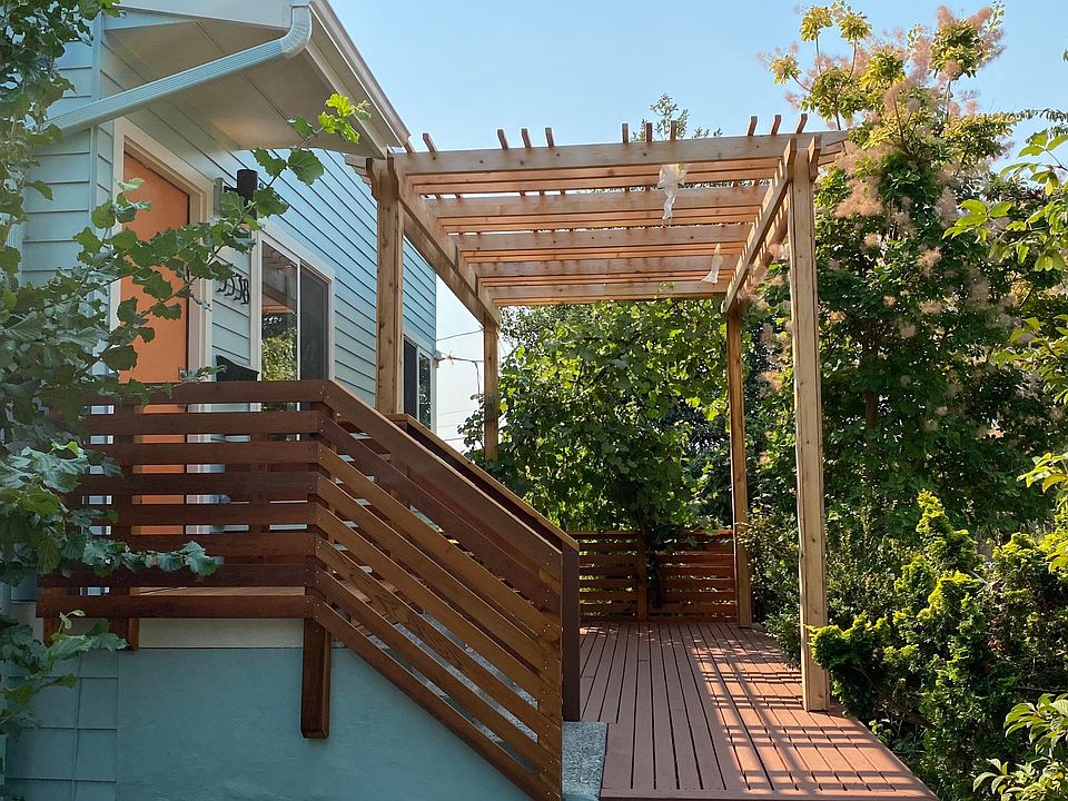 Front entrance and patio with arbor