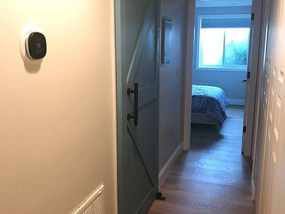 Hall (Guest bathroom behind barn door)