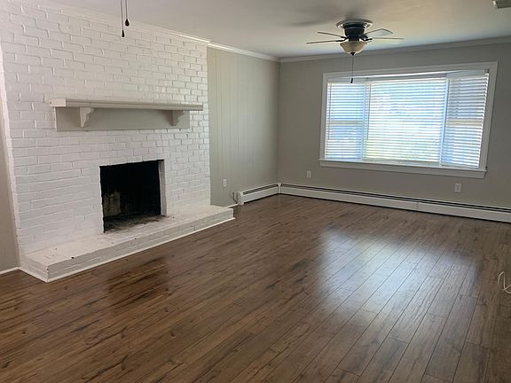 Den with access to back deck