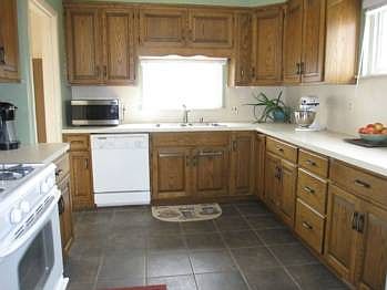 Look at the size of this kitchen! It's loaded with storage space and has newer oven and refrigerator.