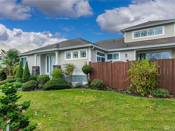 Another view showing off some of the landscaping which is taken care of by a lawn service.