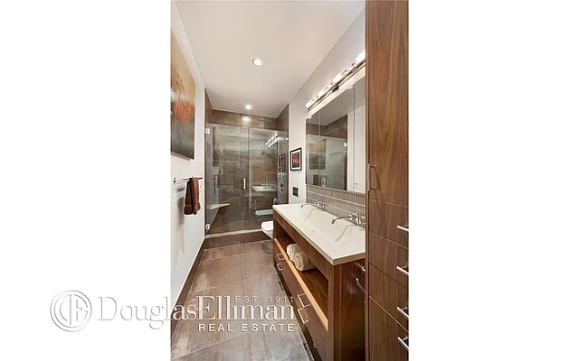 Sold by Douglas Elliman | media 13