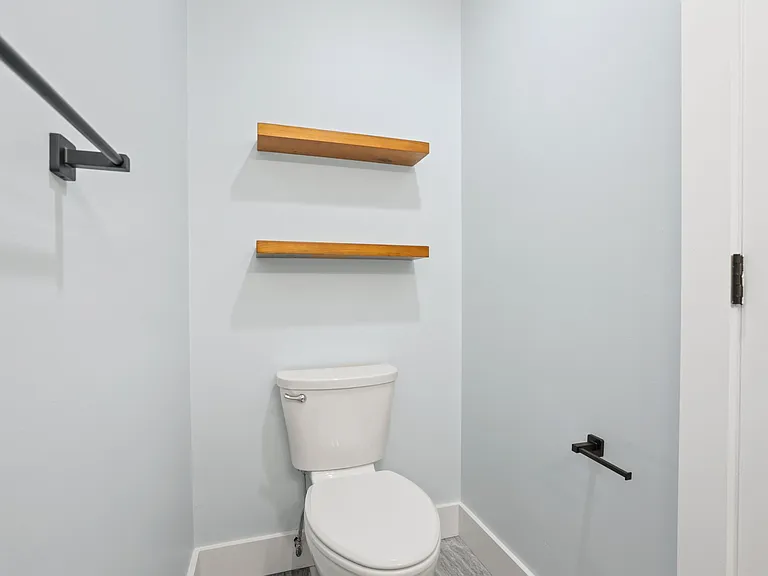 Downstairs hallway half bathroom.