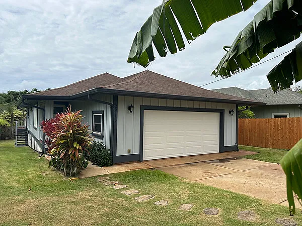 Beautiful and private property! Concrete drive way with a two car garage