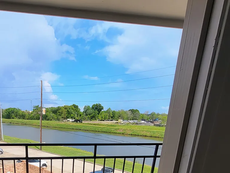 2nd floor, 2 story Apartment Home - Bedroom with 3rd floor Balcony View