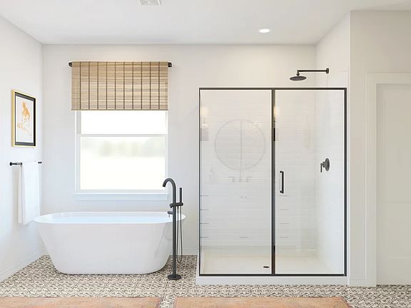 Primary bath with freestanding bath tub