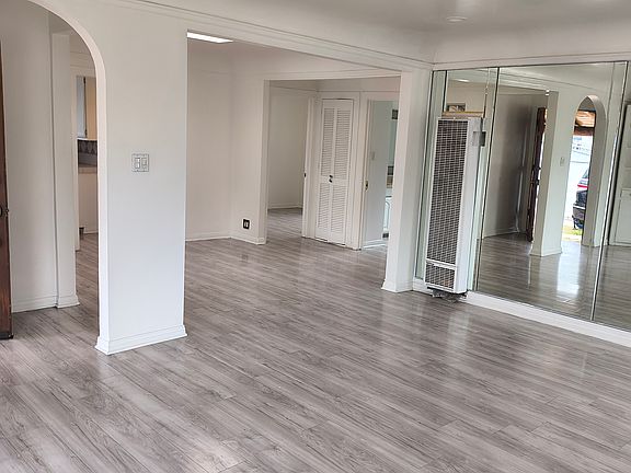 Open living room leading to dining room