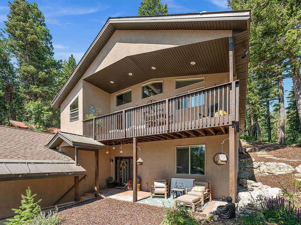 Front door, lower sunny patio and upper deck. Heat tape on front roof.