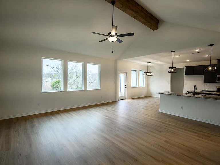Open Concept Family Room looking into Dining and Kitchen