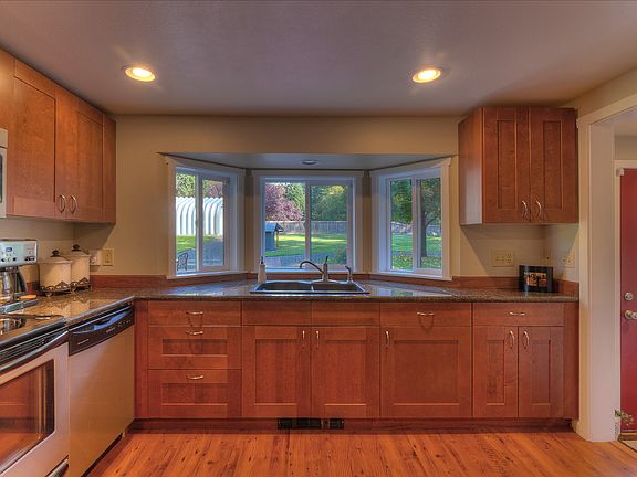 2nd image of 10915 Peacock Hill Ave NW