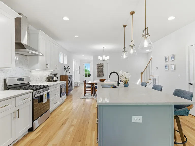 Kitchen with large island and seating space.