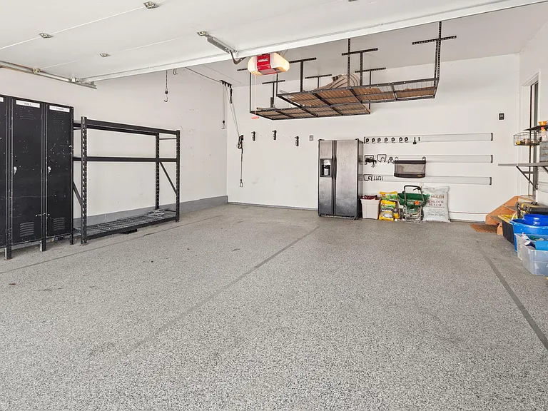 2-car attached garage with overhead storage.