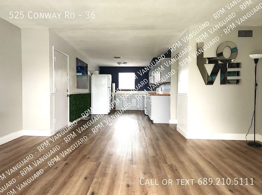 Second Floor Condo Unit with Balcony and Pool View — Photo 3