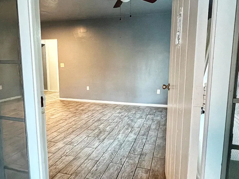 Entrance from mudroom to living room/entrance area