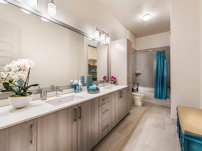 1 bedroom master bath with dual sink vanities