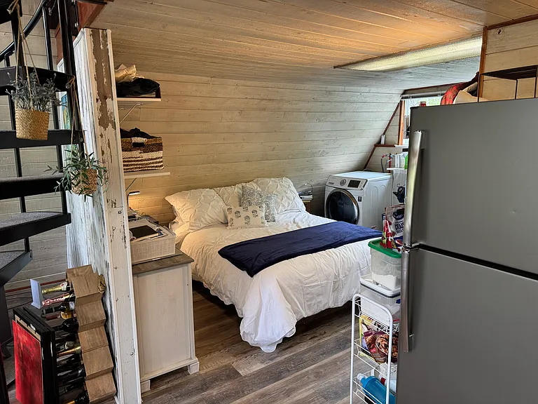 New Queen Matress, full sized washer and dryer, full sized refrigerator, wall shelves and dresser.