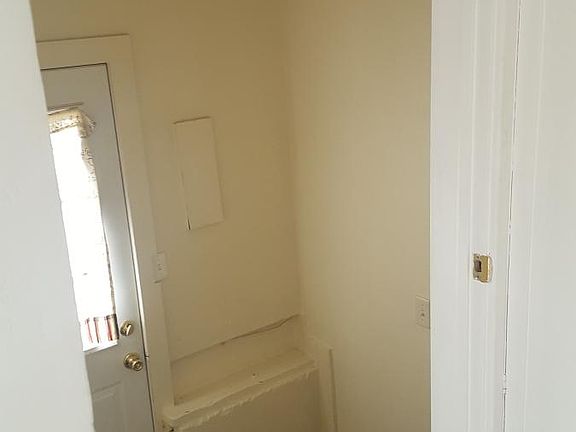 View of back door from Kitchen