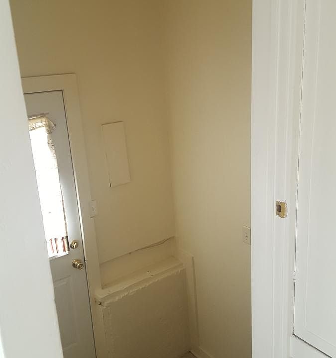 View of back door from Kitchen