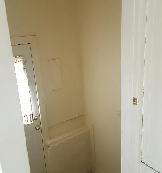 View of back door from Kitchen