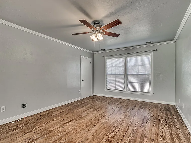 Living room. The door in the picture connects to the garage.