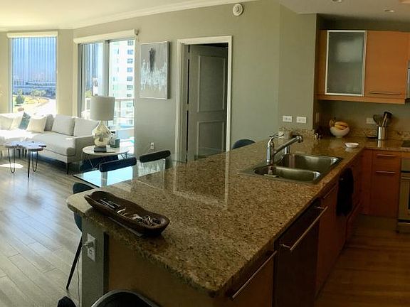 Living room with mountaine and golf course views