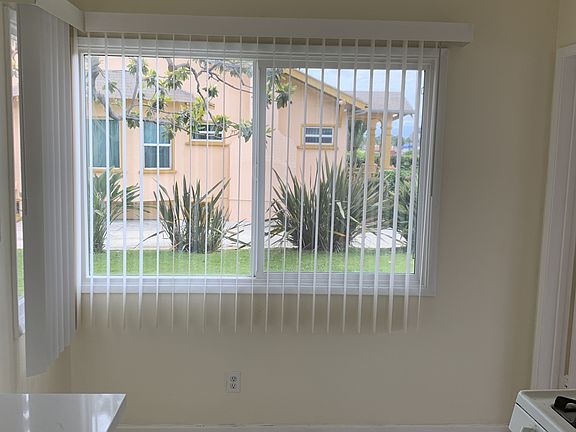 Kitchen and dining area. Both lots of natural light and privacy offered.