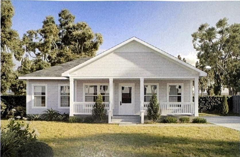 Single story home featuring a porch, brick siding, and a shingled roof
