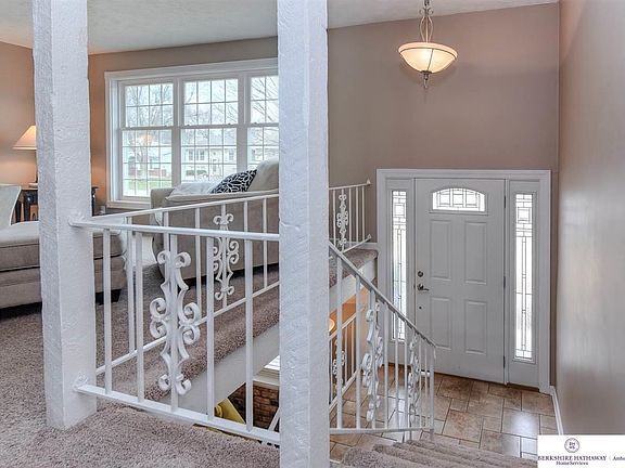 New front door and ceramic tile entry.