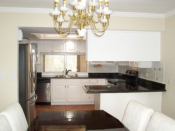 REMODELED GRANITE & STAINLESS KITCHEN