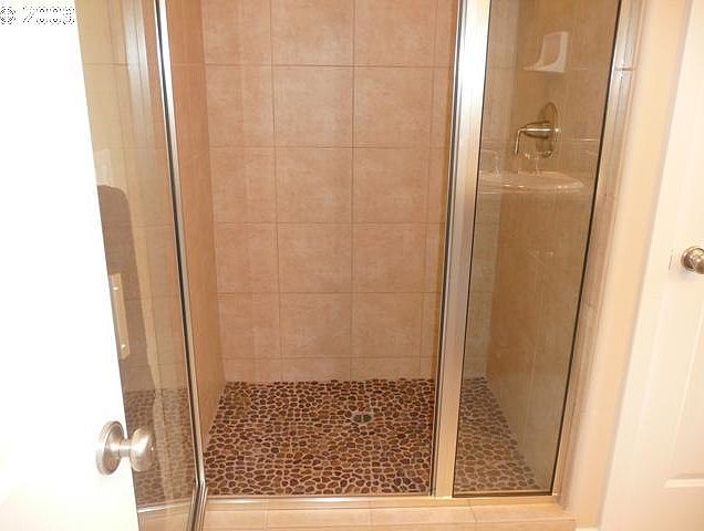 Walk-In, Stone Shower in Master Bath