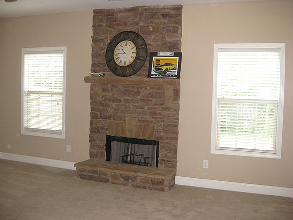 Beautiful stone fireplace surround in living room