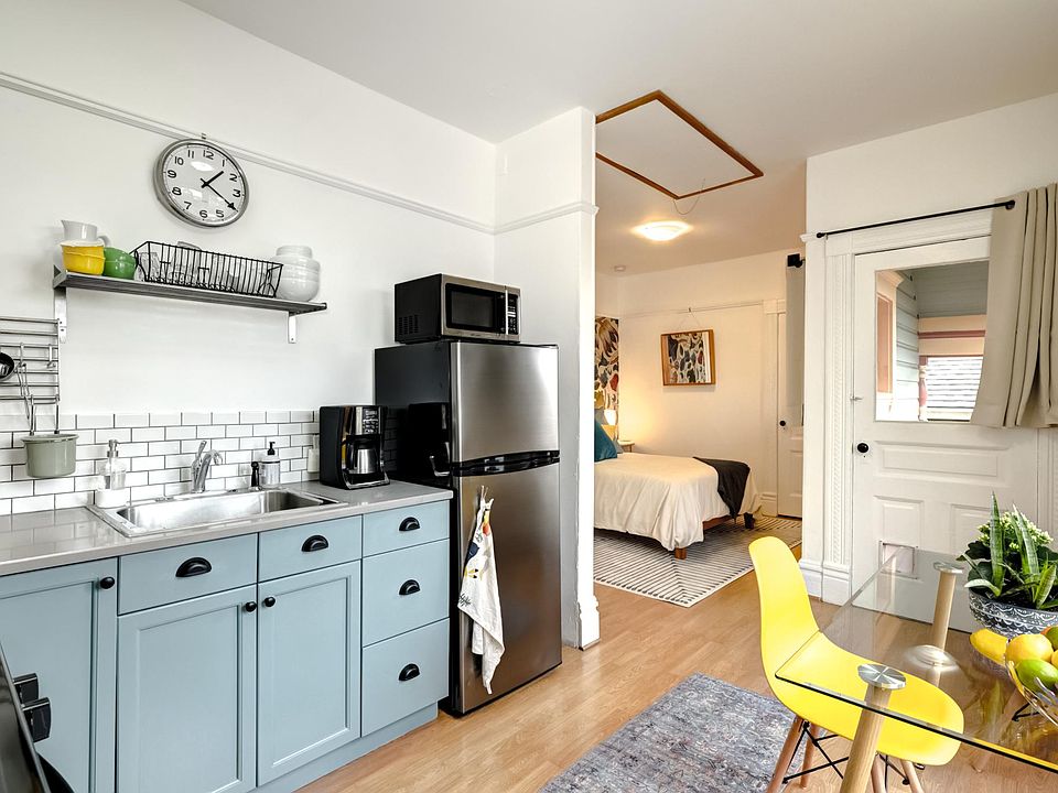 Kitchen opens to balcony.