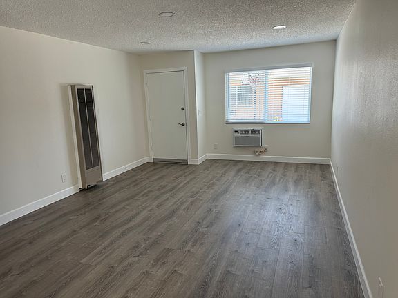 Living Room, New vinyl dual-pane windows throughout.