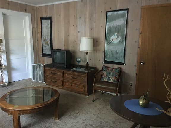 living room, storage closet at corner