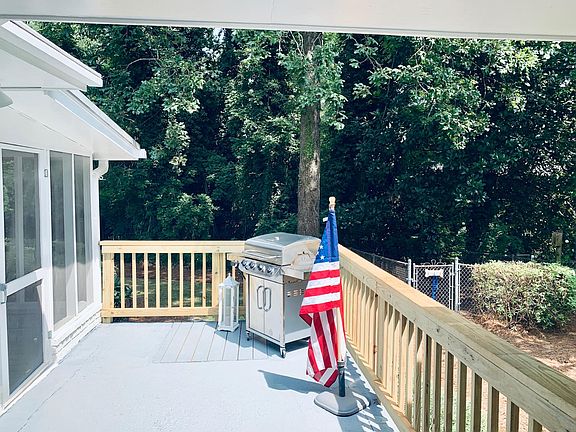 bbq area off of screened porch