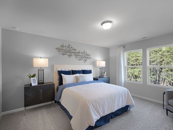 Primary bedroom in the Brentwood floorplan at a Meritage Homes community in Graham, NC.