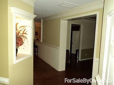 Foyer (another view) : Open and airy; lighted alcove.