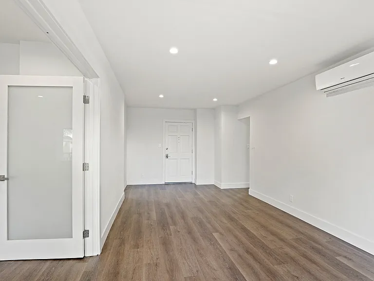 Spacious Bedroom with Wall Heater