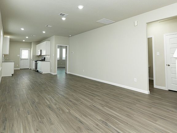 Family Room to Dining Area and Kitchen