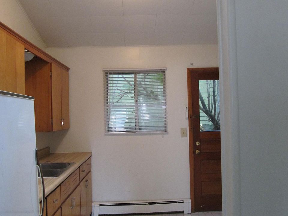 Kitchen, unfurnished, and west side door