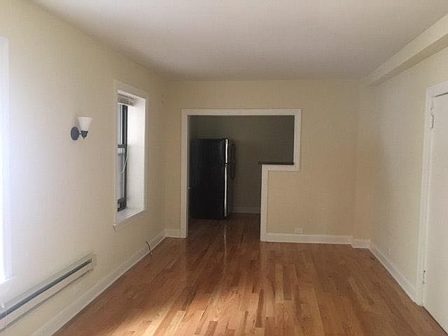 LIving area with refinished floors